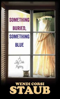 Something buried, something blue : a Lily Dale mystery
